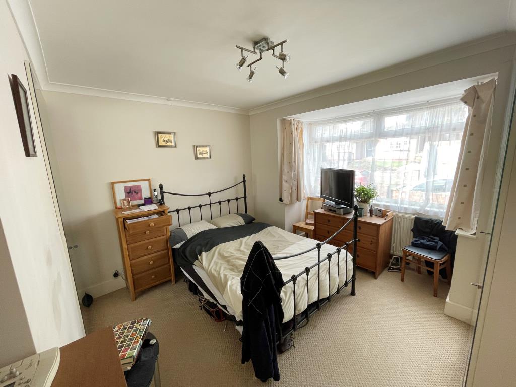 Lot: 38 - TWO-BEDROOM DETACHED BUNGALOW FOR IMPROVEMENT - Bedroom one with bay window